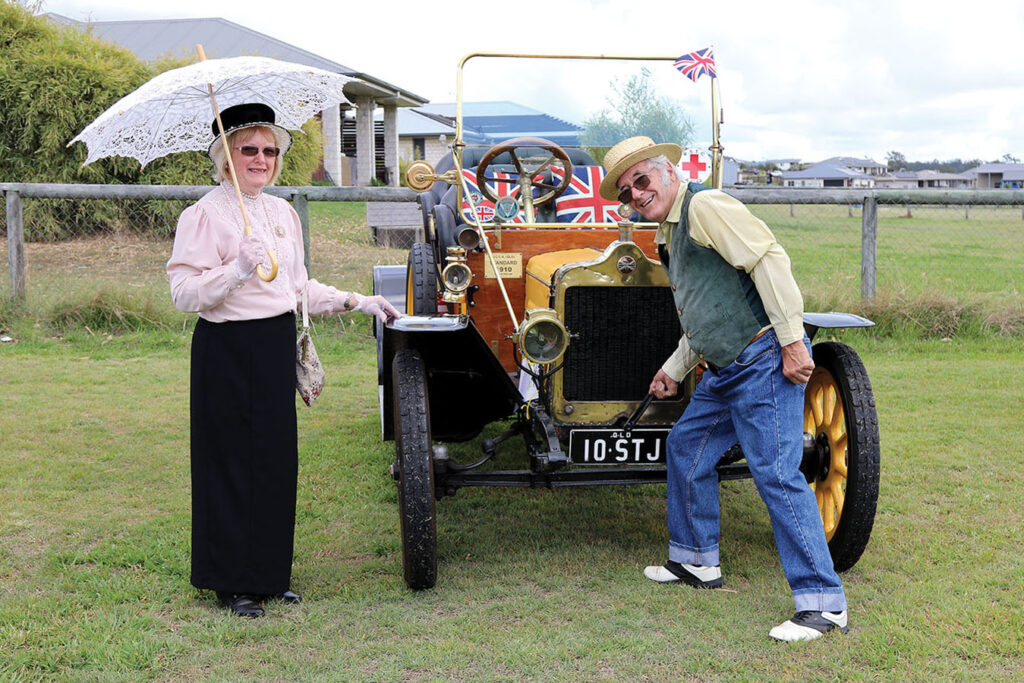 Syd ‘cranks’ the car with Pauline