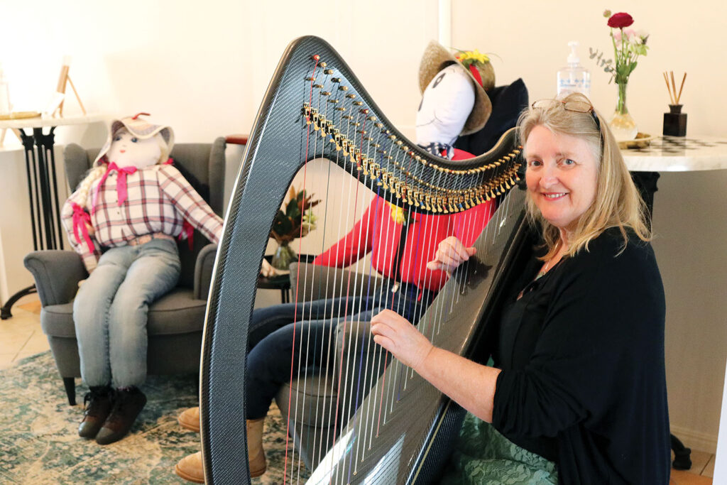 Harpist, Kathryn Foster playing at the Scarecrow High Tea