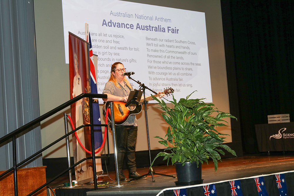 Leading the audience in the Australian Anthem