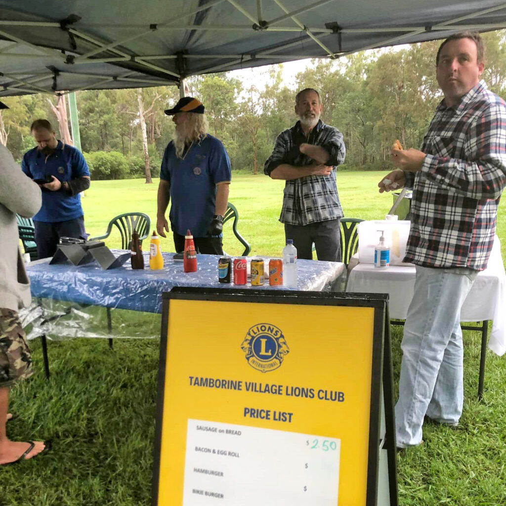 Sharing a Democracy Sausage with the Tamborine Village Lions