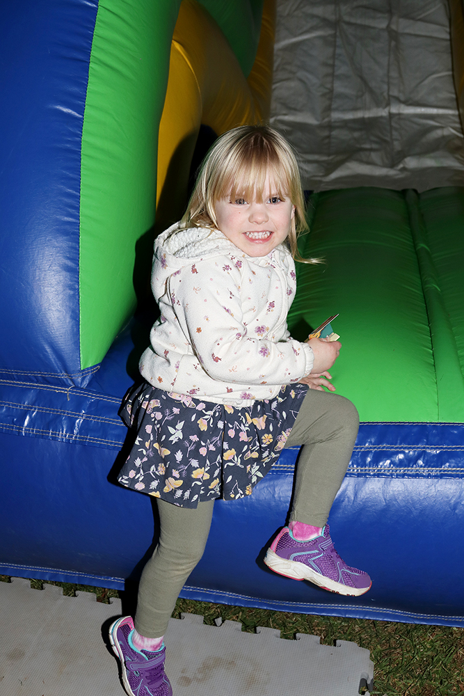 Piper at the end of the inflatable obstacle course