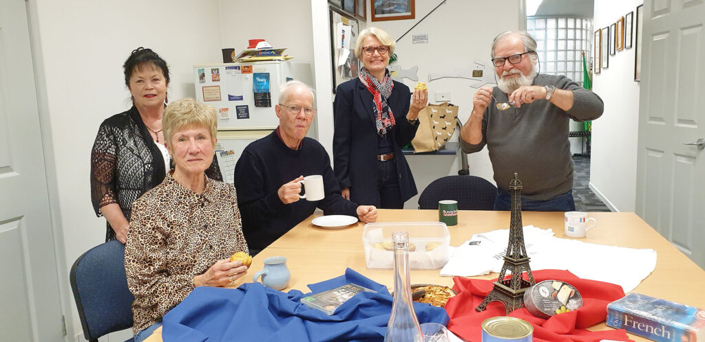 Jayne Meon, Collette Rowe, Gary Moloney, Janine Porter, & Jacques Meon enjoying French style cuisine to celebrate Bastille Day