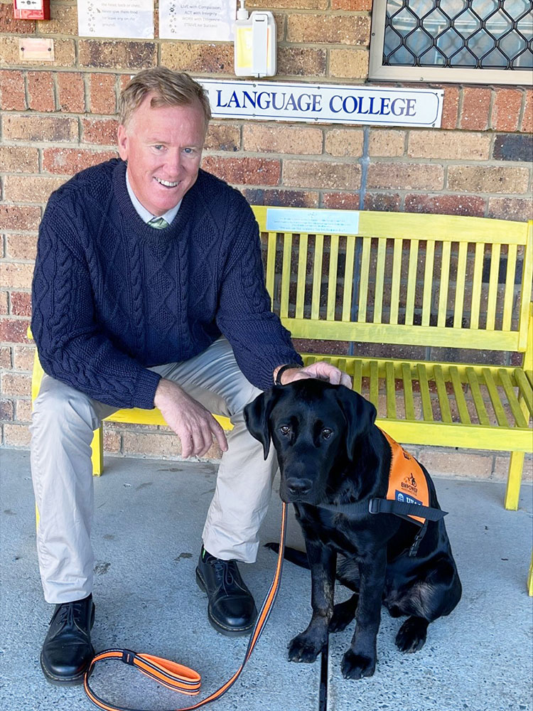 Kevin Lynch - Principal and CEO - with Empower Assistance Dog ‘Barney’
