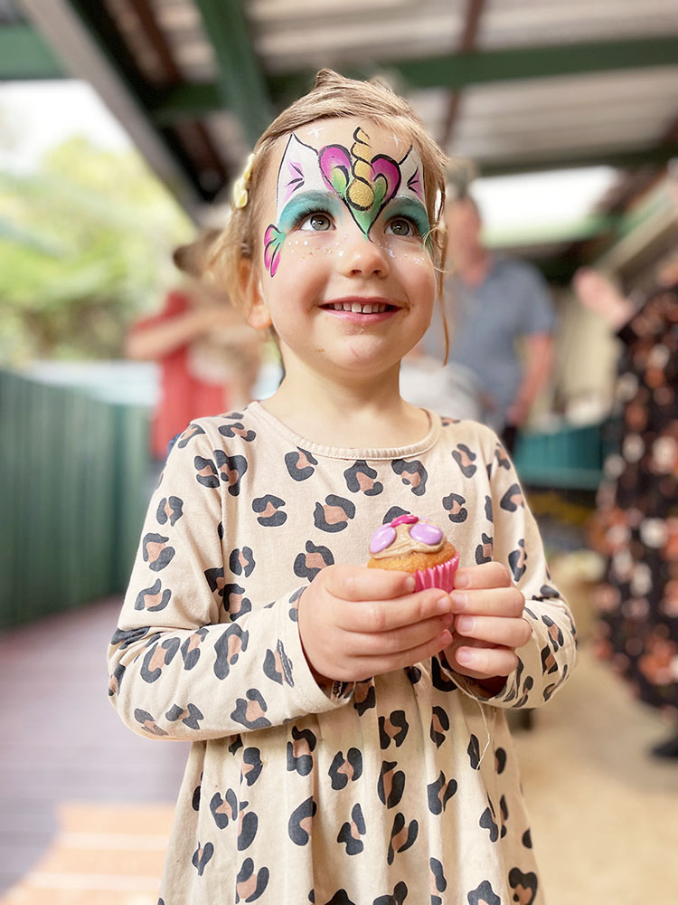 Eden enjoyed a bit of face painting and a cupcake at the Tamborine Mountain Community Kindergarten’s Open Day celebration