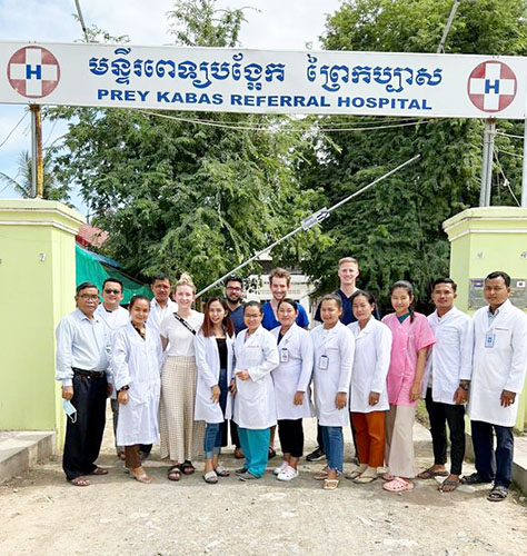 Drs Shade, Sarah, Garry, Pharmacist Peter, with Dr Nourn Sophat (Medical Director), and Staff of Prey Kabas Referral Hospital