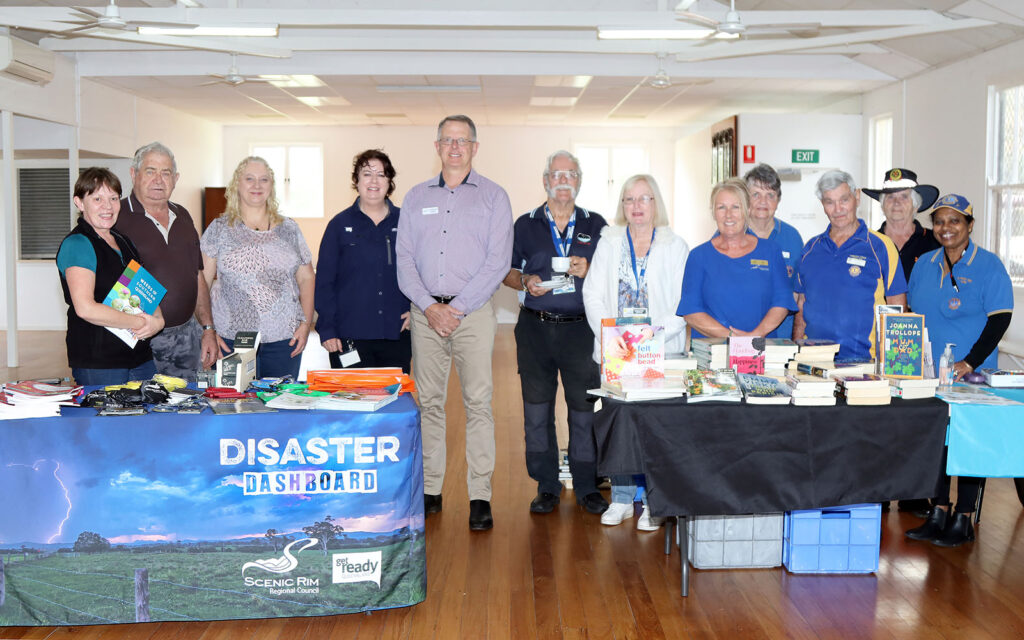 Vanessa Rhind (Rural Living), Rodney Black, Frances Munro (Divine Therapies), Lacey Sawtell (SRRC Officer), Cr Jeff McConnell (Division 2), Syd Norman (TDCA President), Pauline Norman (TDCA Treasurer), Jan Harradine (Outreach Library Service), Lion Margaret O’Brien (Secretary), Lion Paul Krahnen (President), Elizabeth Jobson (TM SES Officer), and Lion Shirlene Potts (Media) enjoying the Cuppa In The Communi-Tea @ the Hall
