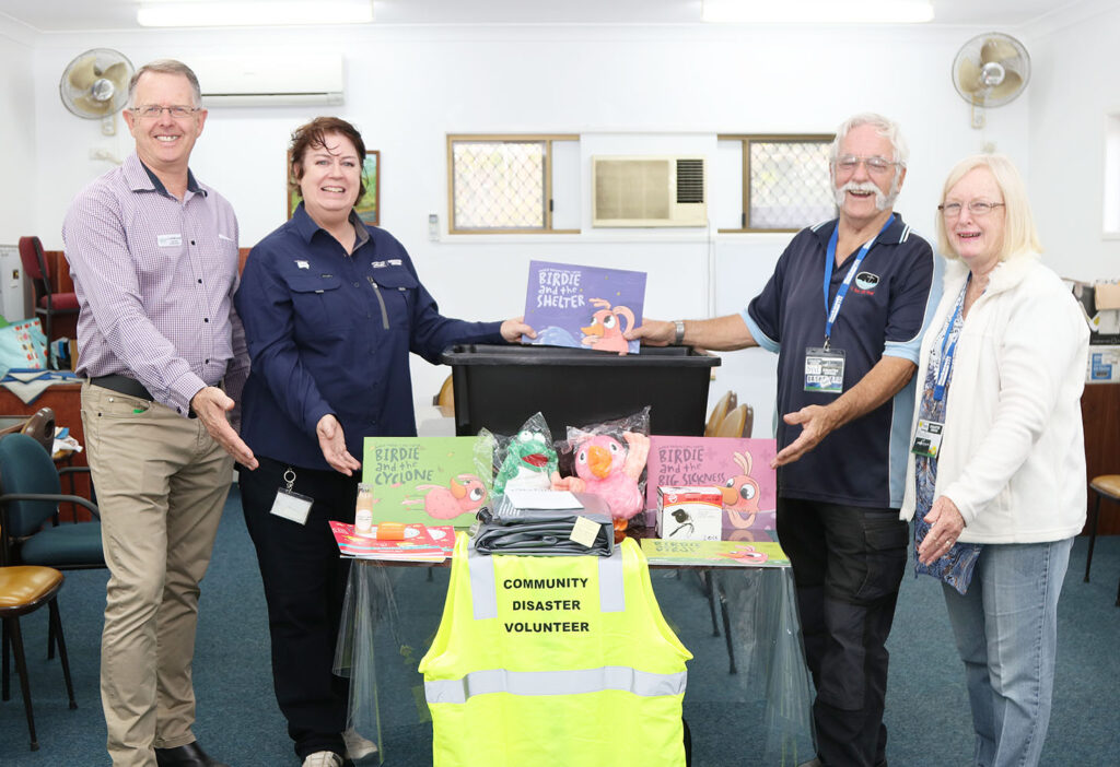 Division 2 Councillor Jeff McConnell, SRRC Community Development Officer Lacey Sawtell, Community Disaster Volunteers Syd & Pauline Norman presenting the Disaster Recovery Kit donated by the Scenic Rim Council