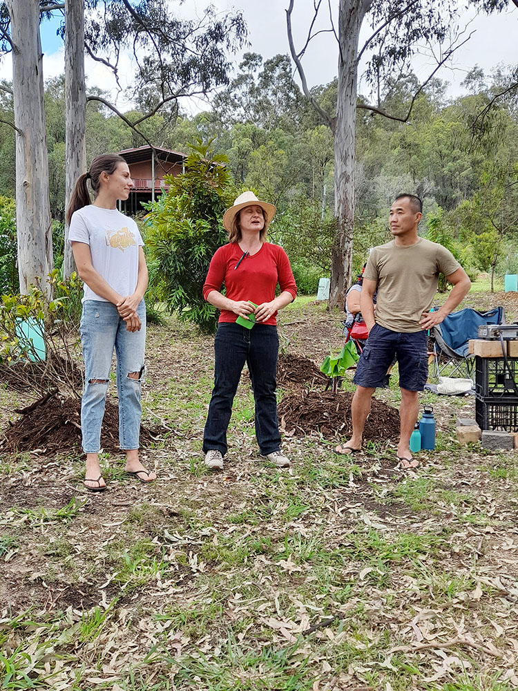 Doreen Jackman from Permaculture Connect (center), with Tamborine Village Homestead’s Yana Vatutina (left) and Eddie Cheung (right)